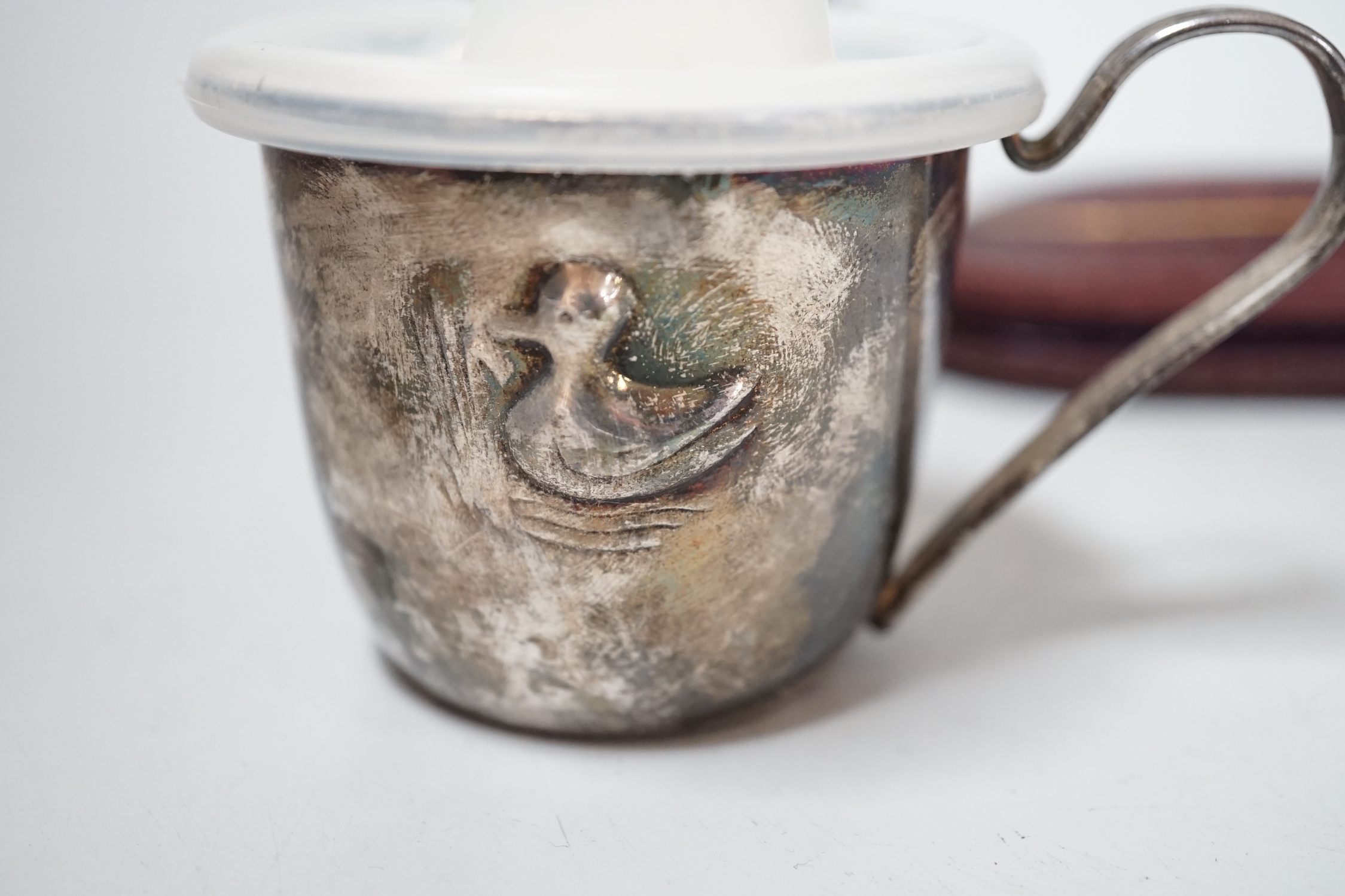 A George V silver christening mug, a cased Victorian silver christening spoon by George Adams and a plated christening mug.